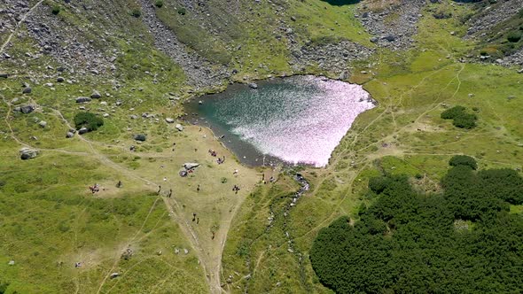 Flying Above Iezer Glacial Lake, Rodnei Mountains, Eastern Carpathians, Romania alt