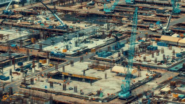 Time Lapse of Construction Site with Heavy Construction Machinery in Metropolis alt
