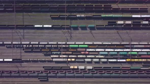 Aerial View of Railway Sorting Station and A Lot of Wagons at a Railway alt