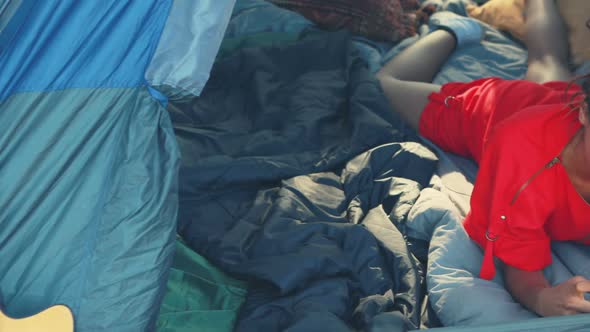 Woman using mobile phone alt