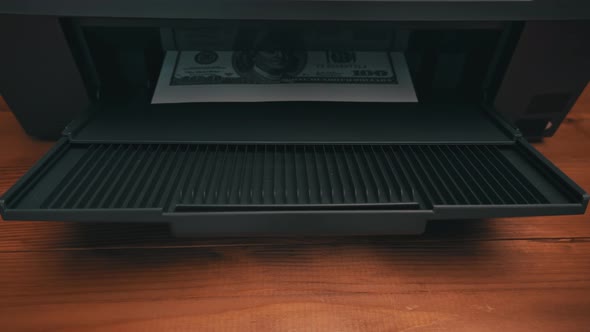 Print on a Counterfeit One Hundred Dollar Bill alt