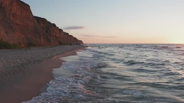 Seashore Camp Site at the Ocean Coast at the Sunset