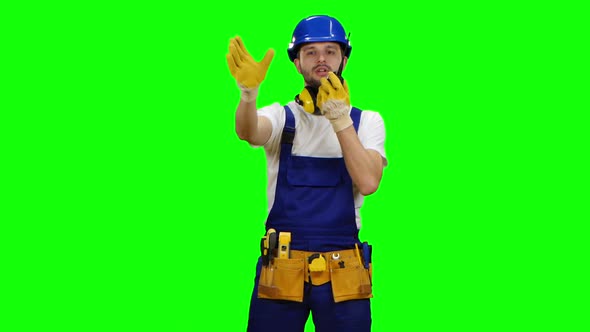 Brigadier Speaks on the Walkie Talkie and Shows a Thumbs-up, Green Screen alt