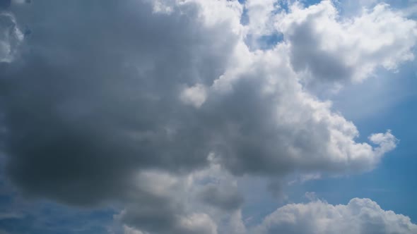 Clouds Move Smoothly in the Blue Sky. Timelapse alt