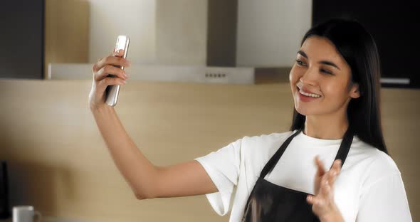 A Nice Woman Calls By Video Link in the Kitchen Tells the Cookie Recipe alt