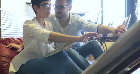 Beautiful Couple in Love Working on Art Class Project Together
