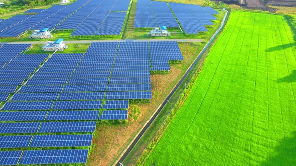 Aerial view of solar power plant. 4k drone footage. alt