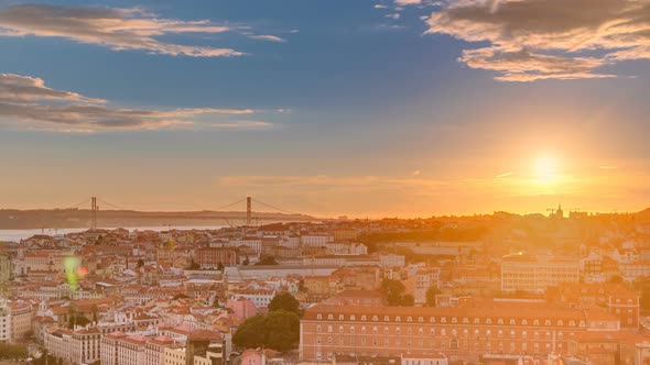 Lisbon at Sunset Aerial Panorama View of City Centre with Red Roofs at Autumn Evening Timelapse alt