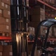 Warehouse Worker on Forklift Placing Load on Shelf - VideoHive Item for Sale