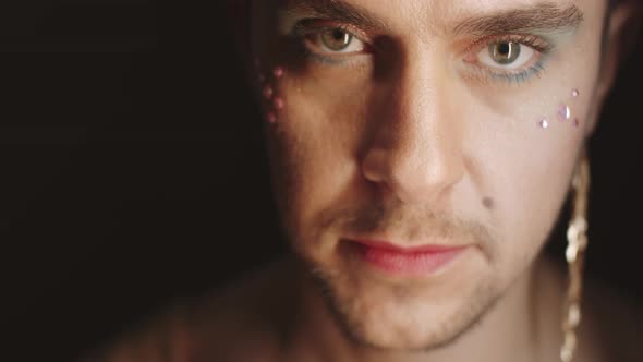 Fashionable Gay Man Posing for Camera in Studio alt