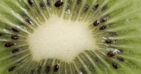 Sliced kiwi rotating close up