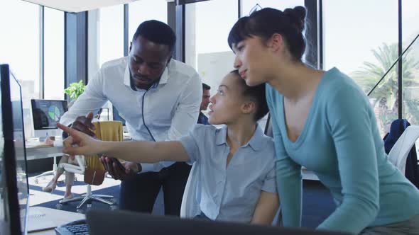 Team working on computer at the office alt