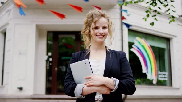 Amazing Looking Student Lady Holding Electric alt