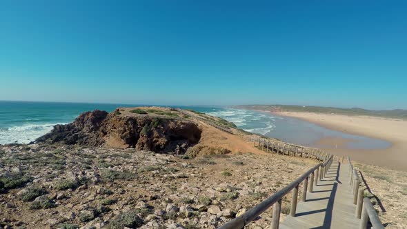 Point of View of Walking on a Boardwalk on the Beach in Costa Vicentina Sagres Portugal alt