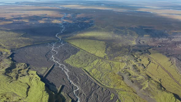 Drone Over Patchwork Landscape With Dry Riverbed Of Braided River alt