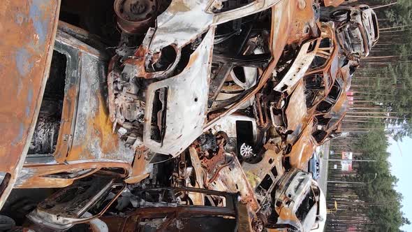 Vertical Video of Destroyed and Shot Cars in the City of Irpin Ukraine alt