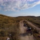 Aerial View From Behind ATVs by Lake and Mountain - VideoHive Item for Sale