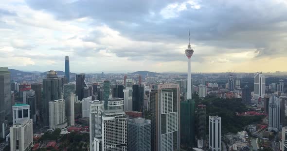 Aerial View on Menara, Petronas Twin Towers and the Downtown, the Footage Is Done By Drone at the