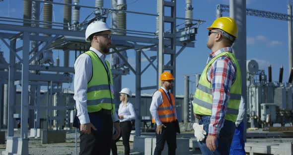 A Group of Electrical Workers alt