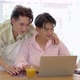 Asian gay couple takes care of boyfriend, surfing on internet during break, give each other hi five - VideoHive Item for Sale