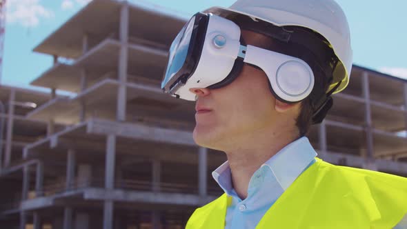 Workplace of freelance worker at home office. Young man works using computer. alt