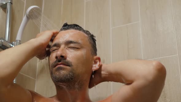 Man Cleans His Head