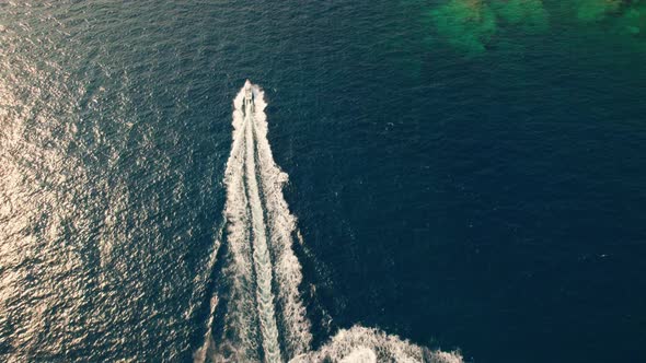 Drone Over Boats In Sea Just Off Coastline Of Cap De Creus alt
