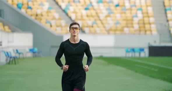 Male Running on Stadium