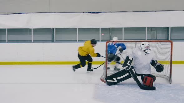 Ice hockey player hitting the post