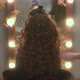The Hairdresser Fixes Curly Hair with Hairspray - VideoHive Item for Sale