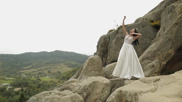Beautiful and Lovely Bride Standing on the Mountain Hills, Woman in Love alt