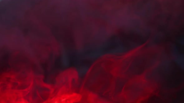 Real Red Smoke on Blur Background