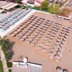 Flight Over the Beach with Umbrellas Towards the Pool in a Luxury Hotel - VideoHive Item for Sale