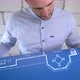 Construction engineer examines the blueprints of the building - VideoHive Item for Sale
