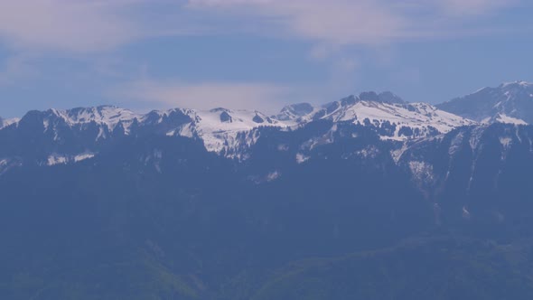 Beautiful Landscape of the Snowy Peaks of the Alpine Mountains in Switzerland alt