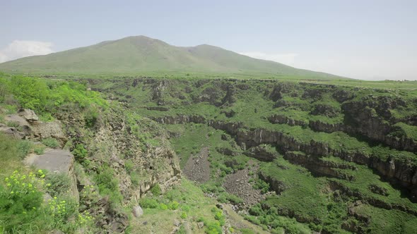 Rocks with Stones and Cliffs in the Canyon Where the River Flows in Nature alt