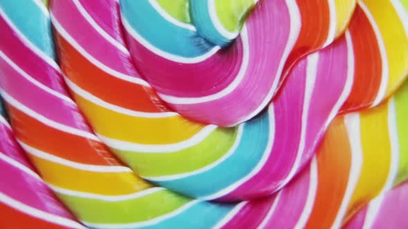 Background of Striped Spiral Multicolor Lollipop