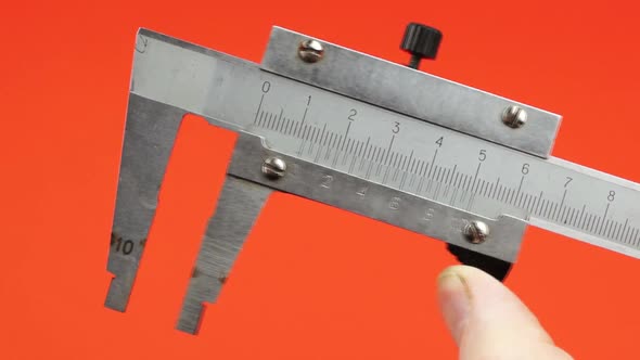 Close-up of vernier caliper, vernier caliper jaws are bred for measurement alt