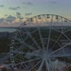 Aerial view of the Ferris wheel on the beach at sunset - VideoHive Item for Sale