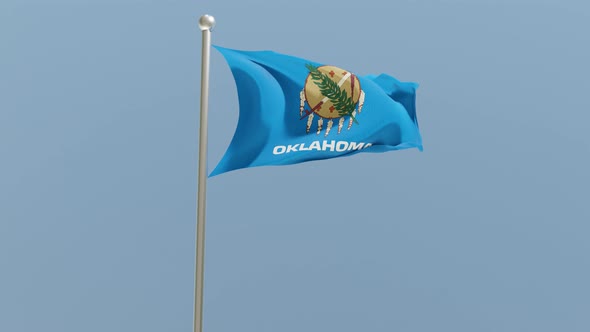 Oklahoma flag on flagpole. alt
