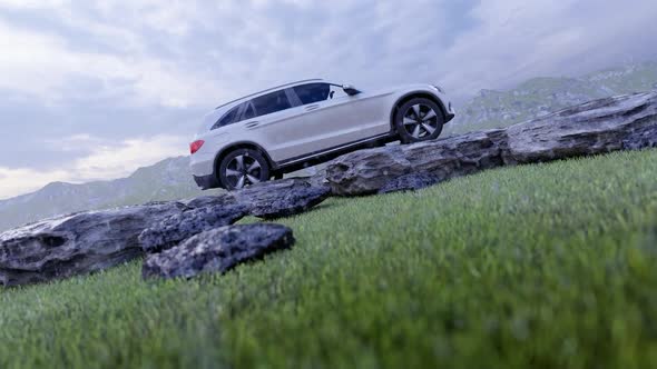 White Luxury Off-Road Vehicle Standing on Rocks in Rainy Weather