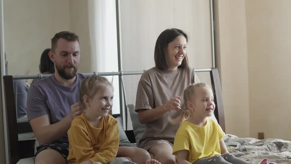 Mom and Dad are Braiding the Kids