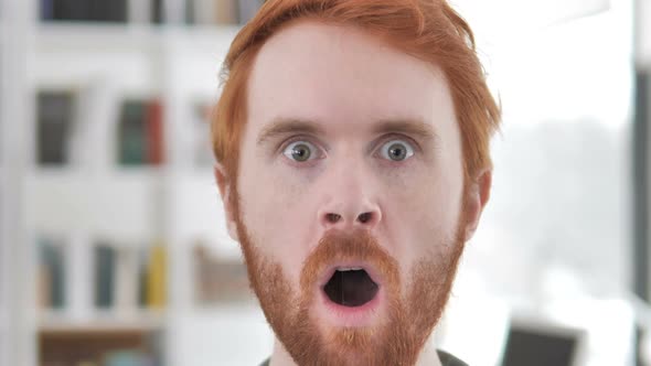 Shocked Face of Casual Redhead Man alt