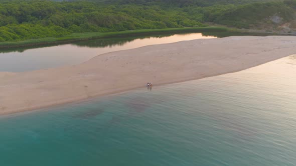 Aerial Drone View of Wide Sand Stripe Between Veleka River and Black Sea. Calm Water Surface alt