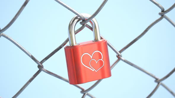Closeup view at the red padlock with heart hanging on fence. Bridge. Love. 4k HD alt