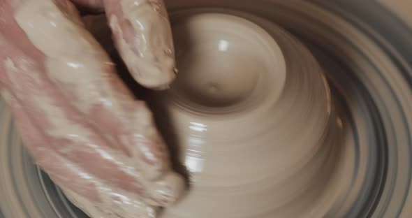 Potter Makes Pottery From Clay Close Up. Making Ceramic Products From White Clay. Twisted Potter's alt