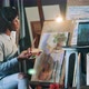 Africanamerican Woman is Having a Remote Painting Class