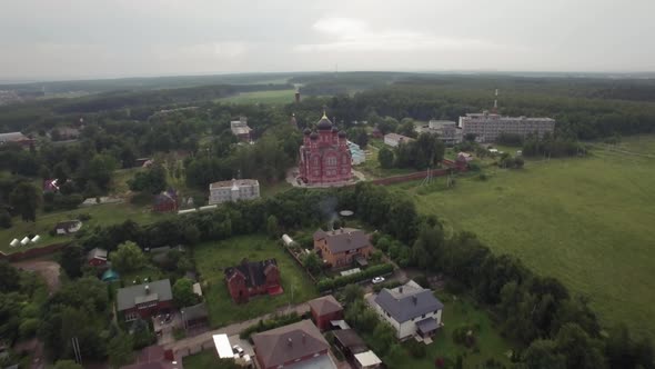 Flying Over Lukino Village with Cathedral of Ascension alt