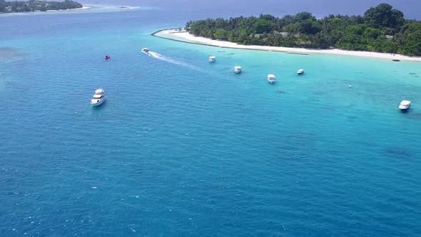 Aerial panorama of island beach break by ocean with sand background alt
