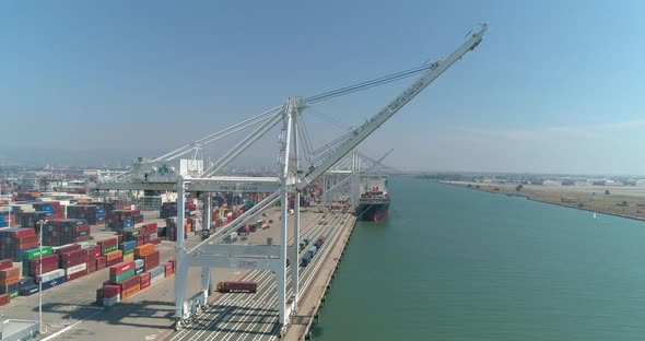 Aerial view of container ships and lifting cranes in the Port of Oakland California alt